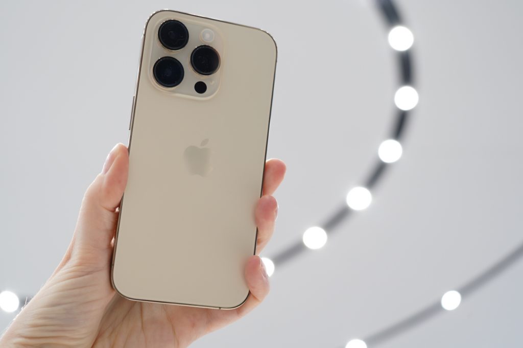 Unlike the standard iPhone models, iPhone 14 Pro features a three-camera array. Photo by Allison Johnson / The Verge 