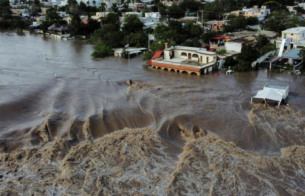 Sông Sabinas chảy tràn do mưa lớn gây ra thiệt hại nghiêm trọng ở Sabinas, bang Coahuila, Mexico ngày 1/9. 